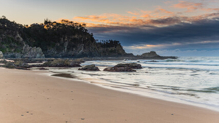 Sunrise seascape and low cloud bank