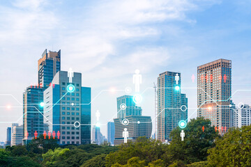 Obraz premium Social media icons hologram over panorama city view of Bangkok, Asia. The concept of people networking and connections. Double exposure.