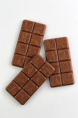 handmade milk chocolate, natural on a white background, top view