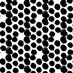 Grunge dots seamless pattern. Abstract vintage polka dot pattern. Background with round brush strokes. Monochrome hand drawing of texture