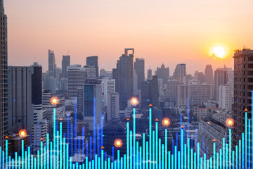 Market behavior graph hologram, sunset panoramic city view of Bangkok, popular location to achieve...
