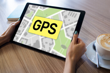 GPS Global Positioning System, Worldwide navigation and tracking concept with town maps on screen.