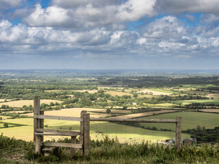 Fototapeta premium tunning vibrant landscape image of English countryside on lovely Summer afternoon overlooking rolling hills and country villages