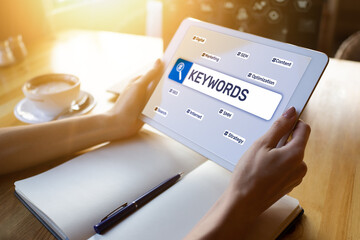Keywords. SEO, Search engine optimization and internet marketing concept on screen.