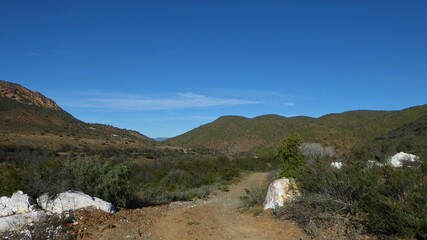 Country Dirt Track and Large Quartz Rocks in the Little Karoo