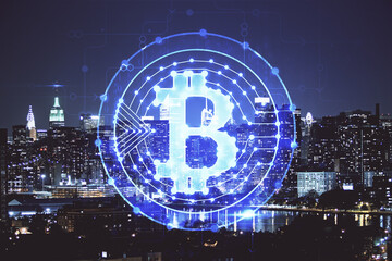 Multi exposure of cryptocurrency theme hologram drawing and city veiw background. Concept of blockchain and bitcoin.