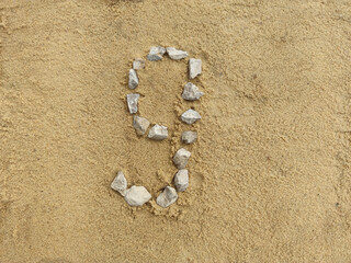 Number 9 on the sand, laid with fine gravel