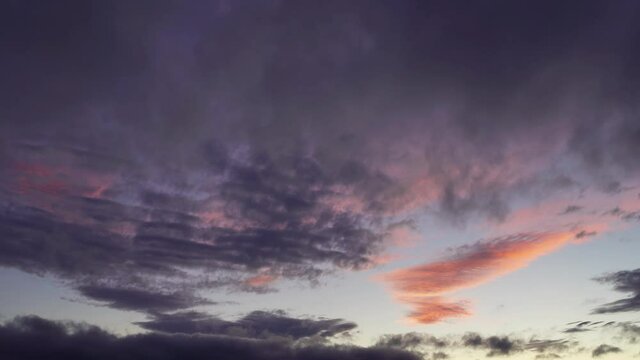 Scudding clouds at dusk.

Dark fast moving clouds shot as the sun sets.