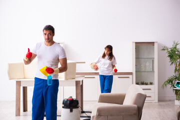 Young pair doing housework at home