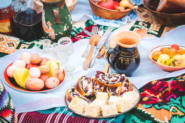 Old-fashioned homemade food served in nature in the field