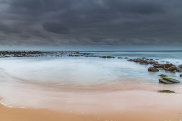 Rain Clouds at Copacabana - Overcast Sunrise Seascape
