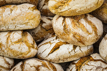 Many rustic fresh bread loaves