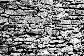 Texture of a brick wall with cracks and scratches which can be used as a background