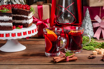 Beautiful delicious cake with bright red berries on the Christmas table