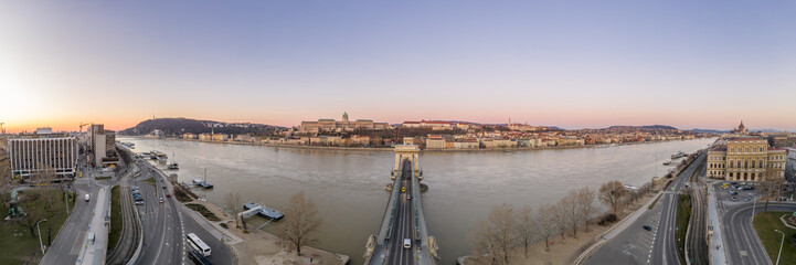 Panoramic aerial drone shot of Buda Castle on Buda hill before Budapest sunrise