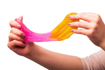 a toy for children mucus and liquid flowing on hand on a white background