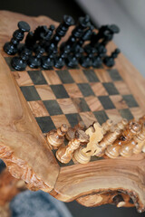 Wooden chess. Eco concept. Eco house. Competition concept