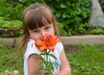 Caucasian girl outdoors with lily flowers