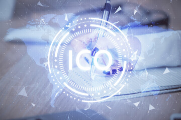 Cryptocurrency hologram over woman's hands writing background. Concept of blockchain. Double...