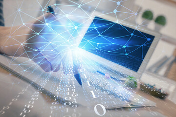 Double exposure of hands making notes with digital coding icons. Computer learning concept.