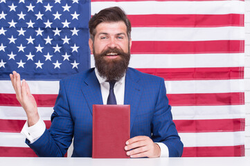 Student visa. Visa applicant hold book on american flag background. Diversity visa. USA green card...