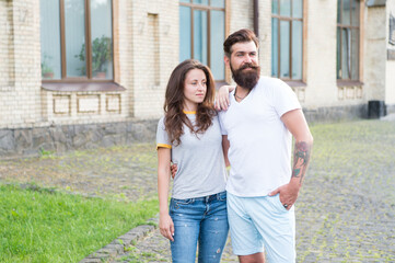 Love should not be all on one side. Couple in love. Love affair. Developing love relationship. Bearded man and adorable woman summer outdoors. Lovers in casual style. Boyfriend and girlfriend