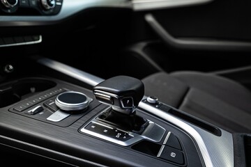 Fototapeta na wymiar Modern car interior. Automatic gearshift change lever.