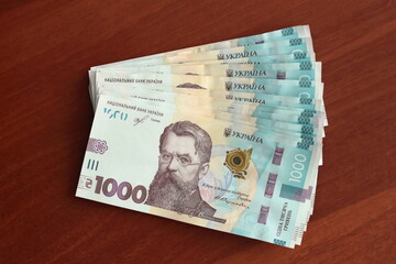 Money on the table. Ukrainian currency