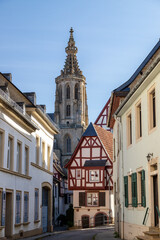 Cobbled road with historic houses and Schlosskirche in Meisenheim