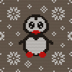 Jacquard knitted seamless pattern with cute penguin and snowflakes. Winter background with nature and animals. Scandinavian style. Vector illustration.