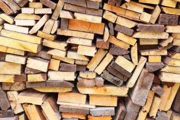 Pile wood. Deforestation theme. Wood industry. Chopped wood Woodpile scene