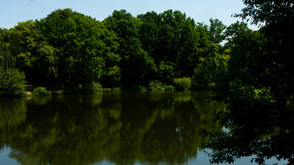 Fototapeta na wymiar Beautiful views in the Silesian park in Chorzów. Ready for entry.