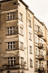 Old tenements like pictured on a vintage postcard.