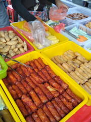 Malaysian cakes are on display for sale on the table. Sort by type to make it easier for customers to buy.
