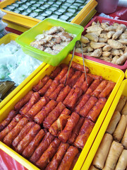 Malaysian cakes are on display for sale on the table. Sort by type to make it easier for customers to buy.
