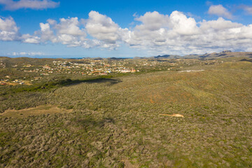 Aerial view of coast of Curaçao in Caribbean Sea with turquoise water, cliff and beautiful coral...
