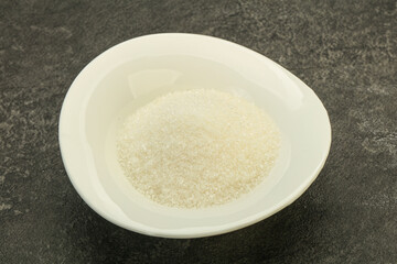 White sugar in the bowl