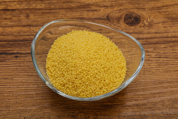 Raw cous cous heap in the bowl