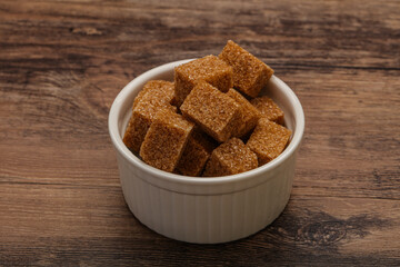 Cane sugar cubs in the bowl