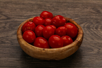 Pickled cherry tomatoes in the bowl