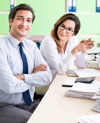 Fototapeta premium Two colleagues working in the office