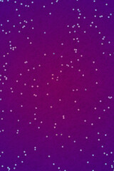 Dark purple felt textured fabric with glitter closeup background