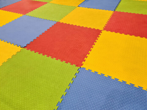 Full Frame Background of Colorful Tiled Jigsaw Mats for Yoga or Playground