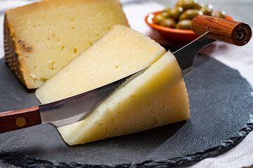 Spanish tapas, manchego cheese made from sheep milk and green olives