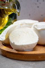 Fresh handmade soft Italian cheese from Campania, white balls of buffalo mozzarella cheese made from cow milk ready to eat
