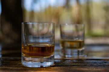 Tasting of scotch single malt whisky from Islay island, most intensely flavoured of all whiskies in Scotland