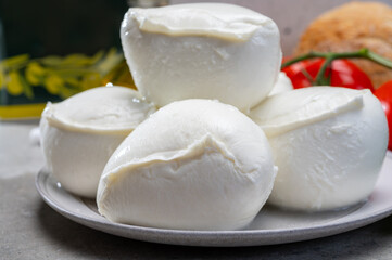 Fresh handmade soft Italian cheese from Campania, white balls of buffalo mozzarella cheese made from cow milk ready to eat