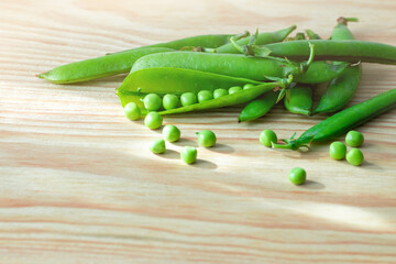 Green young peas natural background.