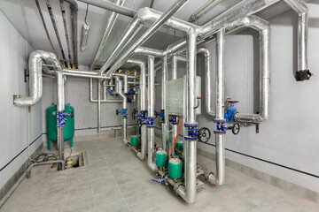 engineering designs of an industrial boiler room with many pipes and valves