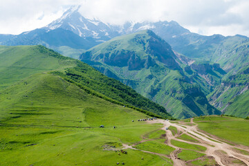 Caucasus Mountains view from Gergeti Trinity Church on Kazbegi National Park in Kazbegi, Mtskheta-Mtianeti, Georgia.